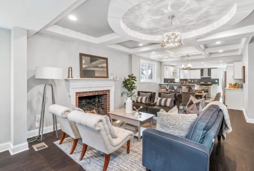 Beautiful,Renovation,With,Coffered,Ceiling,Showing,Living,Room,With,Brick